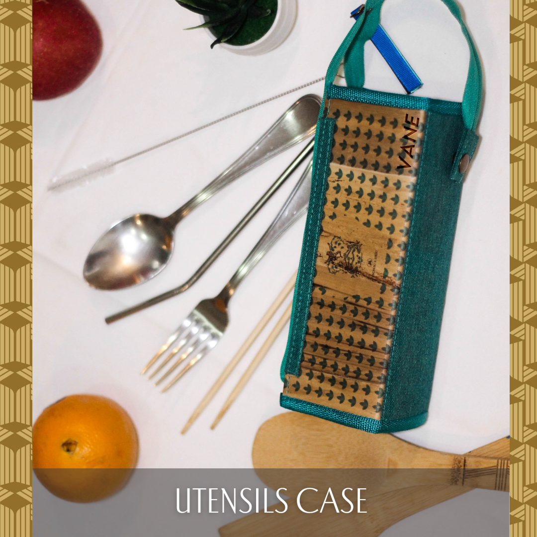 A teal vegan leather pencil case that can carry utensils.